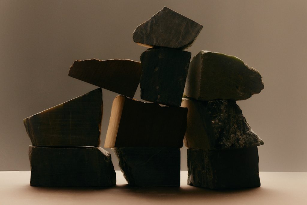 Varied stone blocks of different shapes balanced into one stack