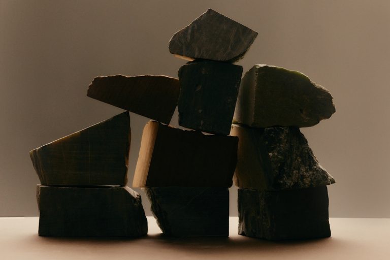 Varied stone blocks of different shapes balanced into one stack